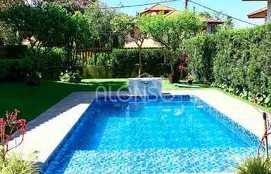 Imagem: A casa em condomínio possui 3 Dormitórios, 3 Banheiros, 5