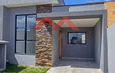 Imagem: A casa possui 3 Dormitórios, 2 Banheiros, 2 Vagas na garagem