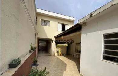 Imagem: A casa possui 3 Dormitórios, 2 Banheiros, 5 Vagas na garagem