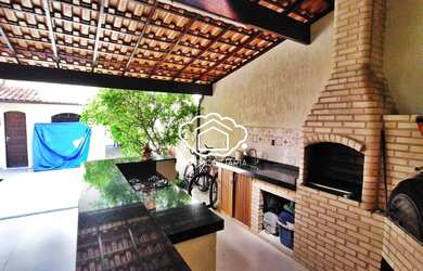 Imagem: A casa possui 2 Dormitórios, 3 Banheiros, 1 Vaga na garagem