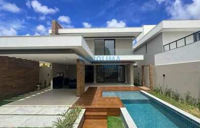 Imagem: A casa em condomínio possui 4 Dormitórios, 5 Banheiros, 4