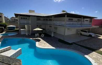 Imagem: A casa possui 5 Dormitórios, 5 Banheiros, 5 Vagas na garagem