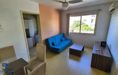 Imagem: O apartamento possui 1 Dormitório, 1 Banheiro, 1 Vaga na garagem