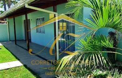 Imagem: A casa possui 4 Dormitórios, 2 Banheiros, 2 Vagas na garagem