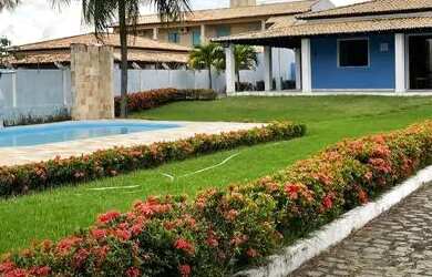 Imagem: A casa possui 4 Dormitórios, 5 Vagas na garagem e está localizado