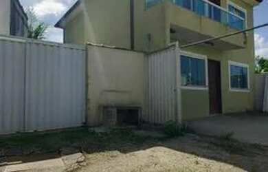 Imagem: A casa possui 2 Dormitórios, 1 Banheiro, 2 Vagas na garagem