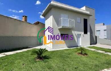 Imagem: A casa em condomínio à venda possui 3 Dormitórios, 3 Banheiros