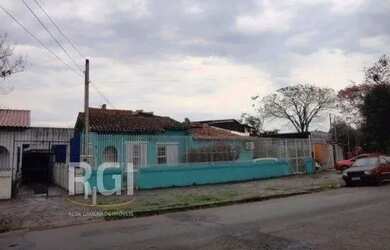 Imagem: A casa possui 3 Dormitórios, 1 Banheiro, 1 Vaga na garagem