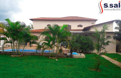 Imagem: A casa em condomínio possui 5 Dormitórios, 5 Banheiros, 5