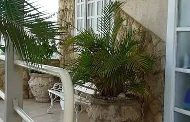 Imagem: A casa possui 3 Dormitórios, 3 Banheiros, 5 Vagas na garagem