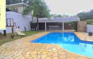 Imagem: A casa em condomínio possui 4 Dormitórios, 5 Banheiros, 4