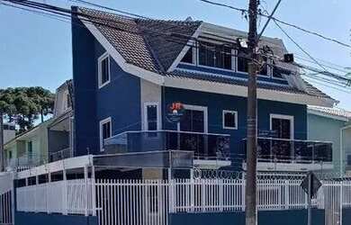 Imagem: A casa possui 3 Dormitórios, 4 Banheiros, 2 Vagas na garagem