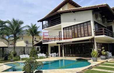 Imagem: A casa possui 5 Dormitórios, 3 Banheiros, 4 Vagas na garagem