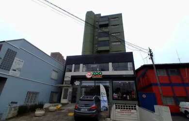 Imagem: O apartamento possui 3 Dormitórios, 1 Banheiro, 2 Vagas na