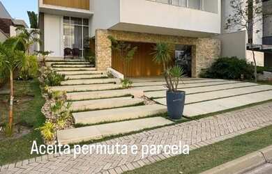 Imagem: A casa em condomínio possui 4 Dormitórios, 4 Banheiros, 2