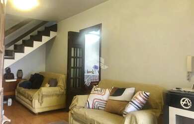 Imagem: A casa possui 3 Dormitórios, 2 Banheiros, 1 Vaga na garagem