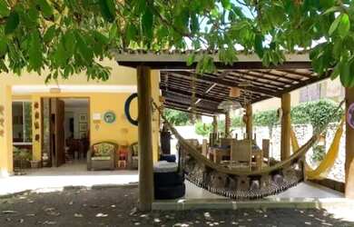 Imagem: A casa em condomínio possui 5 Dormitórios, 5 Banheiros, 4