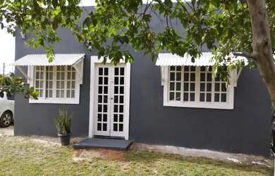 Imagem: A casa possui 2 Dormitórios, 2 Banheiros, 5 Vagas na garagem