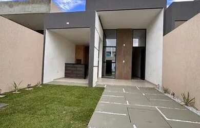 Imagem: A casa possui 4 Dormitórios, 3 Banheiros, 2 Vagas na garagem