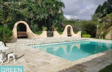 Imagem: A casa em condomínio possui 4 Dormitórios, 4 Banheiros, 5