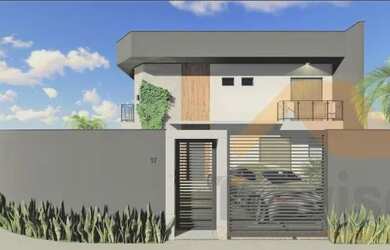 Imagem: A casa possui 3 Dormitórios, 2 Banheiros, 2 Vagas na garagem