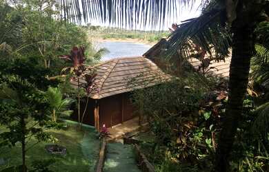 Imagem: A casa possui 2 Dormitórios, 3 Banheiros, 3 Vagas na garagem