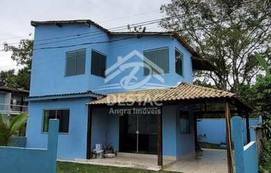 Imagem: A casa possui 3 Dormitórios, 3 Banheiros, 3 Vagas na garagem