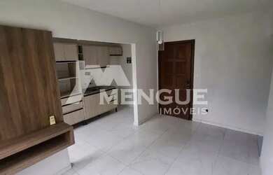 Imagem: O apartamento possui 3 Dormitórios, 1 Banheiro, 1 Vaga na garagem