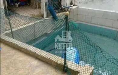 Imagem: A casa possui 5 Dormitórios, 3 Banheiros, 1 Vaga na garagem