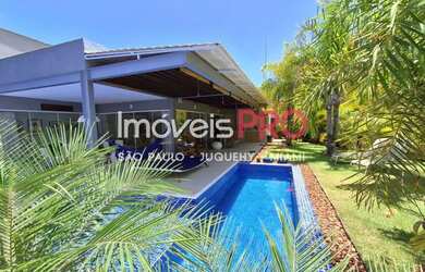 Imagem: A casa em condomínio possui 5 Dormitórios, 5 Banheiros, 4