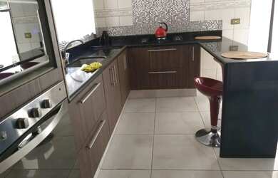 Imagem: A casa possui 3 Dormitórios, 4 Banheiros, 4 Vagas na garagem