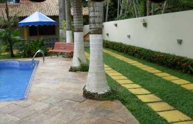 Imagem: A casa em condomínio possui 5 Dormitórios, 3 Banheiros, 5