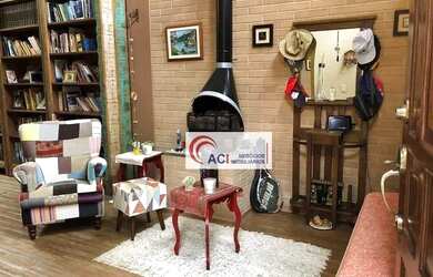 Imagem: A casa em condomínio possui 5 Dormitórios, 4 Banheiros, 5