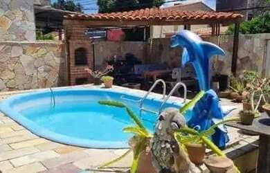 Imagem: A casa possui 4 Dormitórios, 4 Banheiros, 2 Vagas na garagem