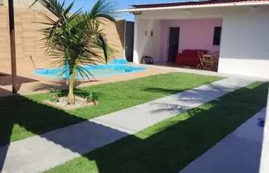 Imagem: A casa possui 2 Dormitórios, 2 Vagas na garagem, 200m² de