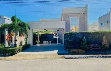 Imagem: A casa possui 4 Dormitórios, 5 Banheiros, 4 Vagas na garagem