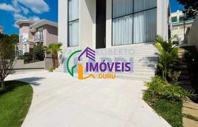 Imagem: A casa em condomínio possui 5 Dormitórios, 5 Banheiros, 5