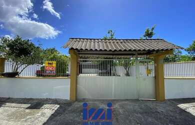 Imagem: A casa possui 4 Dormitórios, 4 Banheiros, 5 Vagas na garagem