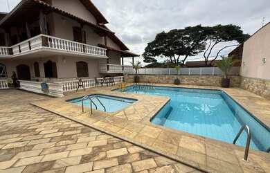 Imagem: A casa possui 5 Dormitórios, 5 Banheiros, 5 Vagas na garagem