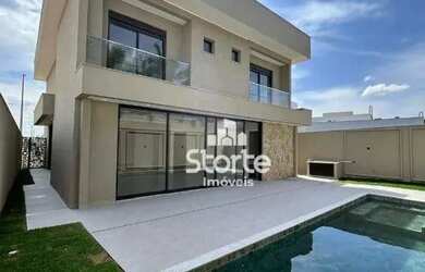 Imagem: A casa em condomínio à venda possui 4 Dormitórios, 5 Banheiros