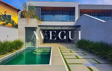 Imagem: A casa em condomínio possui 4 Dormitórios, 4 Banheiros, 4