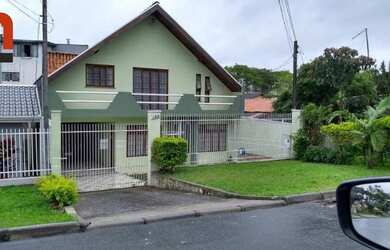 Imagem: A casa possui 3 Dormitórios, 2 Banheiros, 3 Vagas na garagem