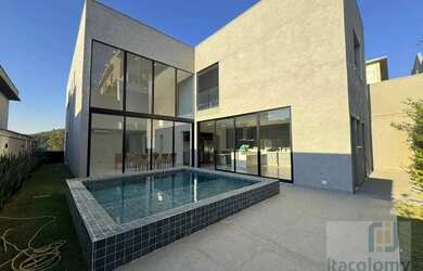 Imagem: A casa em condomínio possui 4 Dormitórios, 5 Banheiros, 4