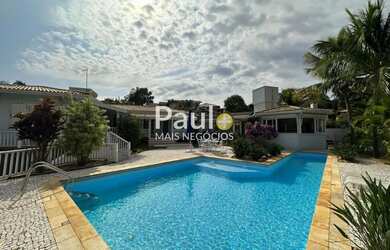 Imagem: A casa em condomínio possui 5 Dormitórios, 5 Banheiros, 5