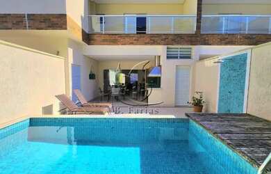 Imagem: A casa em condomínio possui 4 Dormitórios, 5 Banheiros, 2