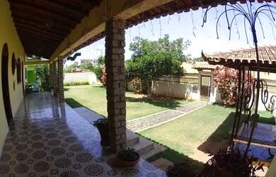 Imagem: A casae possui 4 Dormitórios, 4 Banheiros, 5 Vagas na garagem