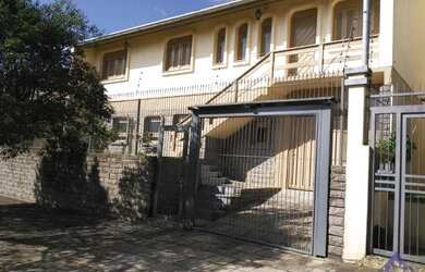 Imagem: A casa possui 3 Dormitórios, 3 Banheiros, 117m² de Área e