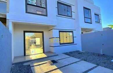 Imagem: A casa possui 3 Dormitórios, 3 Banheiros, 2 Vagas na garagem