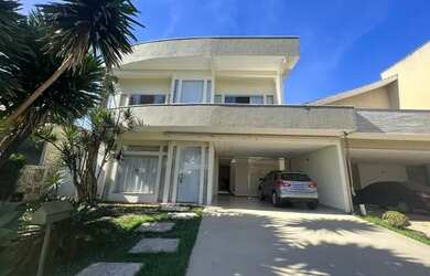 Imagem: A casa possui 3 Dormitórios, 3 Banheiros, 5 Vagas na garagem