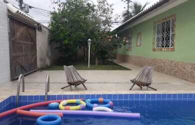 Imagem: A casa possui 3 Dormitórios, 1 Vaga na garagem e está localizado